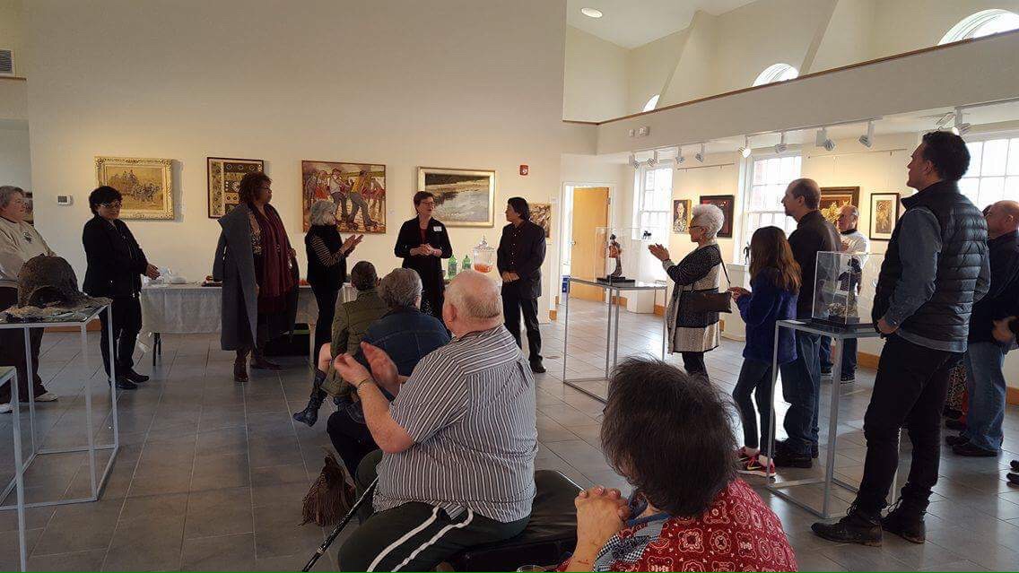 Visitors attending a gallery talk